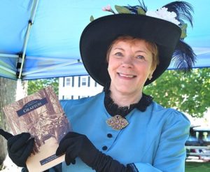 Linda Casey, director of the Grafton Historical Society Museum, displays a copy of “Grafton,” a pictorial book she authored.