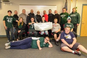 Members of the Grafton Police Alliance present a check to the Grafton Unified Chapter of the Massachusetts Special Olympics Photo/submitted