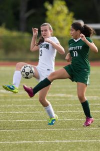 Grafton’s Katelyn Delay and Bartlett’s Lays Napoli both make a play for a loose ball.