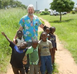 Dr. Brian Lisse with children in Malawi Photo/submitted 