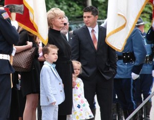 Approaching the church are Jan Cellucci with grandchildren Rhys and Francesca Adams, and family friend Gabe Westberg.