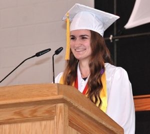Salutatorian and class co-treasurer Samantha Johnson wishes her classmates “oodles of luck.”
