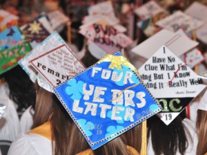 Graduates express themselves with decorated caps.