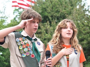 Reciting the Pledge of Allegiance are Johnny Walsh, 13, of Boy Scout Troop 77, and Becky Moran, 14, of Girl Scout Troop 72743. 