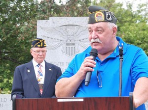 Past Commander Joe Jacobs of American Legion Post 100 serves as master of ceremonies and Past Commander Bill Rivers of AMVETS Post 208 delivers an invocation. 