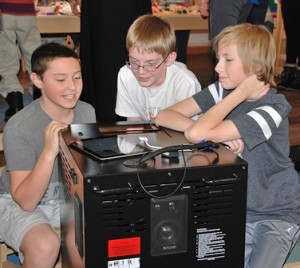 Volunteering as deejays are (l to r) Mikey Peckham, 12; Matthew Sprague, 13; and Jaxon Capobianco, 12.