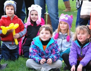 (back, l to r) Jonah Arsenault, 4, his sister Noelle, 6, Reiana Curley, 6, (front, l to r) Hailey Gibbs, 5, and Emma Agostinho, 5, are a captive audience for Fran Flynn’s magic show. 