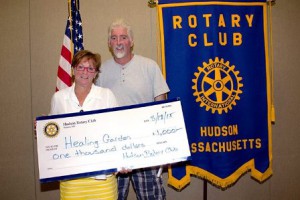 Nanci Bishop, director of development of the Healing Garden, with Greg Parker, president of the Hudson Rotary Club.
