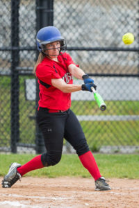 Hudson’s Amanda Doucette hits a fly ball in a recent game