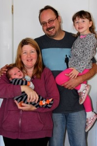 Rob Gibbs and Carol Pinner with daughter, Haley, and newborn son, Robert Photo/Sue Wambolt 