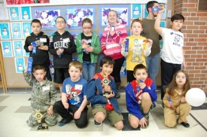Unified Pinewood Derby participants: (back row, l to r) Dominick Branco, Patrick Branco, Hannah Tomyl, Morghan Ghize, Joey Farrell, Marco Luz, and David Calhau; (front row, l to r) Noah Silun, Tommy Farrell, Marcus Reeve-Patel, Kieran Reeve-Patel, and Gabriella Bunni.