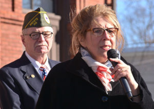 Commander Joe Jacobs of American Legion Post 100 and AMVETS Post 208 introduces state Rep. Kate Hogan. Photos/Ed Karvoski Jr.