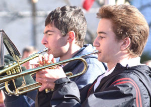Hudson High School Marching Band trumpeters Thomas Bowler and Andrei Ignatiev play “Taps” Photos/Ed Karvoski Jr.