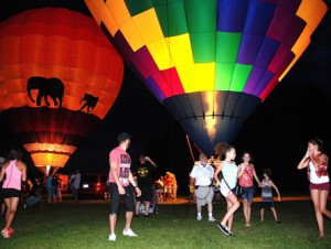 Burners of balloons are lit and create an incandescent glow.