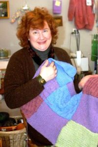 Local woman &#8220;knits it forward&#8221;