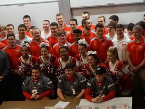 Hudson teen with severe immune system deficiency signs with WPI football