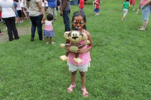 Prisha Nair, 5, won a monkey prize after getting her face painted as a tiger.