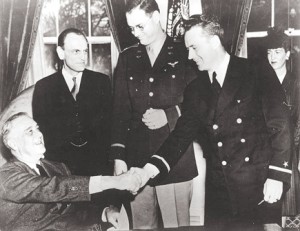 President Franklin D. Roosevelt presents the nation’s first-ever Air Medals, given for valor in flight, to a pair of CAP subchasers – Maj. Hugh R. Sharp, center, and 1st Lt. Edmund “Eddie” Edwards, second from right, in the Oval Office in February 1943. Looking on is James M. Landis, wartime chief of the Office of Civilian Defense. (Photo/submitted)