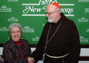 Lydia Whitcomb with Cardinal O'Malley.