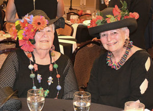 Bette Medine and Joan Ledoux wear Kentucky Derby style hats for the “Fiesta at the Inn” themed Mayor’s Charity Ball. Photos/Ed Karvoski Jr.