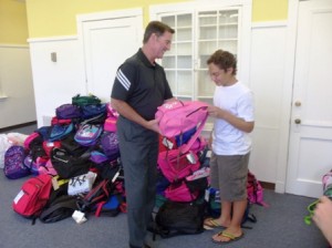 Dennis helps out at Marlborough Community Cupboard&apos;s backpack drive
