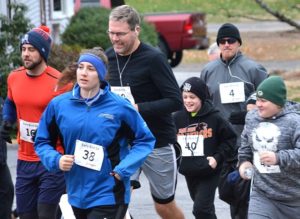 Runners begin the CSF of Marlborough Dollars for Scholars 5K. Photos/Ed Karvoski Jr.