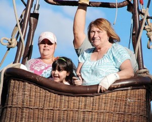 Taking a tethered hot-air balloon ride are (l to r) Tina Baia, her daughter, Arianna, 7, and her aunt, Rosemarie Castoldi.