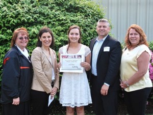Jayna Dixon, Marlborough High School graduate and recipient of the Hologic Scholarship (center), with representatives of Hologic, Inc.: (l to r) Brenda Geary, regulatory affairs specialist; Anne Liddy and Mike Carenzo, assistant general counsel; and Joyce Bourgeois, senior paralegal.