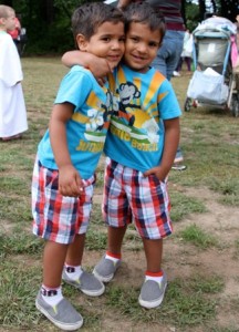 3- year-old twin brothers Andre (l) and Jayson ( r) enjoy the festivities.  (Photo/Heidi Hayes-Pandey) 