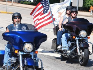 Motorcyclists begin the 48-mile ride.