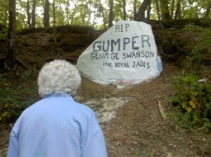 Irene Swanson views the rock painting memorializing her husband, George “Gumper” Swanson.