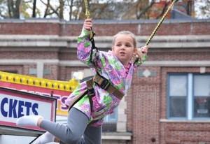 Laila Ginnetti, 6, returns to the carnival a second time because she likes the Bungee Jump.