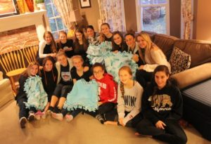 Members of the Juniorettes gathered recently at the home of Katherine Hennessy, a member of the Marlborough Junior Woman's club, and made side-tied blankets to be donated to Marlborough Hospital. Attending were (front row, l to r) Claire Cargill, secretary; Casey Sibole, vice president; Victoria Brietenfeld, treasurer; Emma Hennessy, Aline Keledjian, Grace Becker and Lilly Gill; (Back row, l to r) Krista Fillion, Kayla Munroe, Nicole Gately, Alicia Bibi, Caitlyn Geary, Josie Ouellette, Tess Leduc and Molly Farrell, president. Photo/Submitted