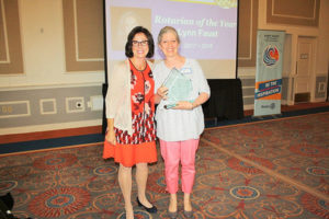 2017-2018 Rotary District 7910 Governor Karin Gaffney (left) presents Marlborough Rotarian Lynn Faust with the glass Rotarian of the Year award. Photo/submitted