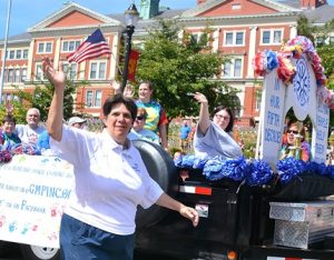 An arch on the Greater Marlborough Projects Inc. float proclaims, “In our fifth decade helping people help themselves,” which won the Marlborough Trophy for best expression of parade theme.
