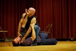 Rehearsing a fight scene in the Ghost Light Players upcoming production of “Macbeth” are Nathan Scott as Macbeth (bottom) and Gene Lejeune as Macduff. (Photo/submitted)