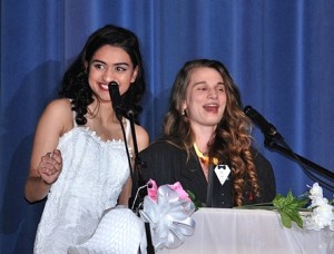 Co-hosts Sophia Naqvi and Charlotte Jolley exchange humorous patter.