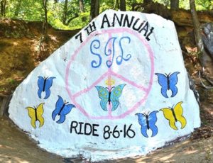 The seventh annual SJL Ride is promoted with a rock painting at the Marlborough and Hudson town line on Route 85.