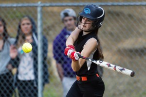 Marlborough’s Jillian Petrie swings at a pitch in a playoff game against Leominster.