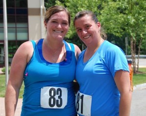 Two local friends celebrate completing their first 5K together.