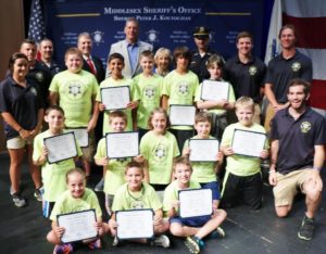 Marlborough youth proudly hold up their certificates after completing the 17th annual Youth Public Safety Academy. (Photo/submitted)