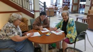Enjoying adult coloring at the Marlborough Senior Center are (left to right) Donna Collett, Judy Jewett, and Janice McCracken. (Photo/submitted)
