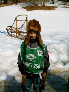 1 - Second-grade student Alexander Todd tries on some dogsledding gear. (Photos/Nance Ebert)