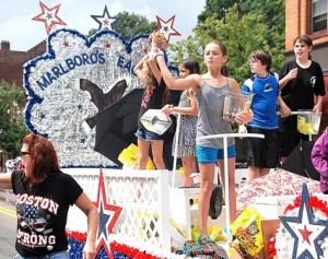 Candy is thrown from the float entered by the Marlborough Fraternal Order of Eagles Aerie 3565.