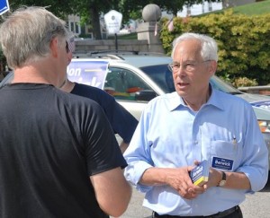 A constituent speaks with Don Berwick, a Democratic candidate for governor. 