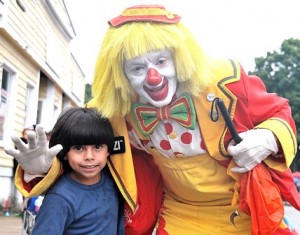 Angel Vallejo, 5, meets Fonzi of the Aleppo Shriners' Clowns.