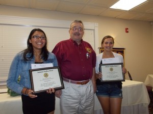 (l to r) Vanessa Rivera from Assabet Valley Regional Technical High School; Lion Robert Page, Scholarship Committee chair; and Jayna Dixon from Marlborough High School.