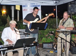 The Jesse Fontaine Trio performs for guests outside of Fish Restaurant & Food Bar.