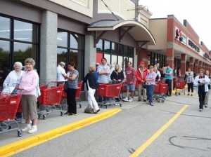 Eager shoppers await the store's opening. 