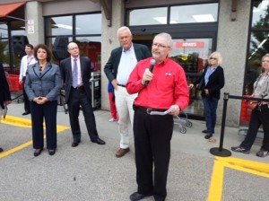 Roger Gauthier, the store's manager, speaks at the ceremony. 